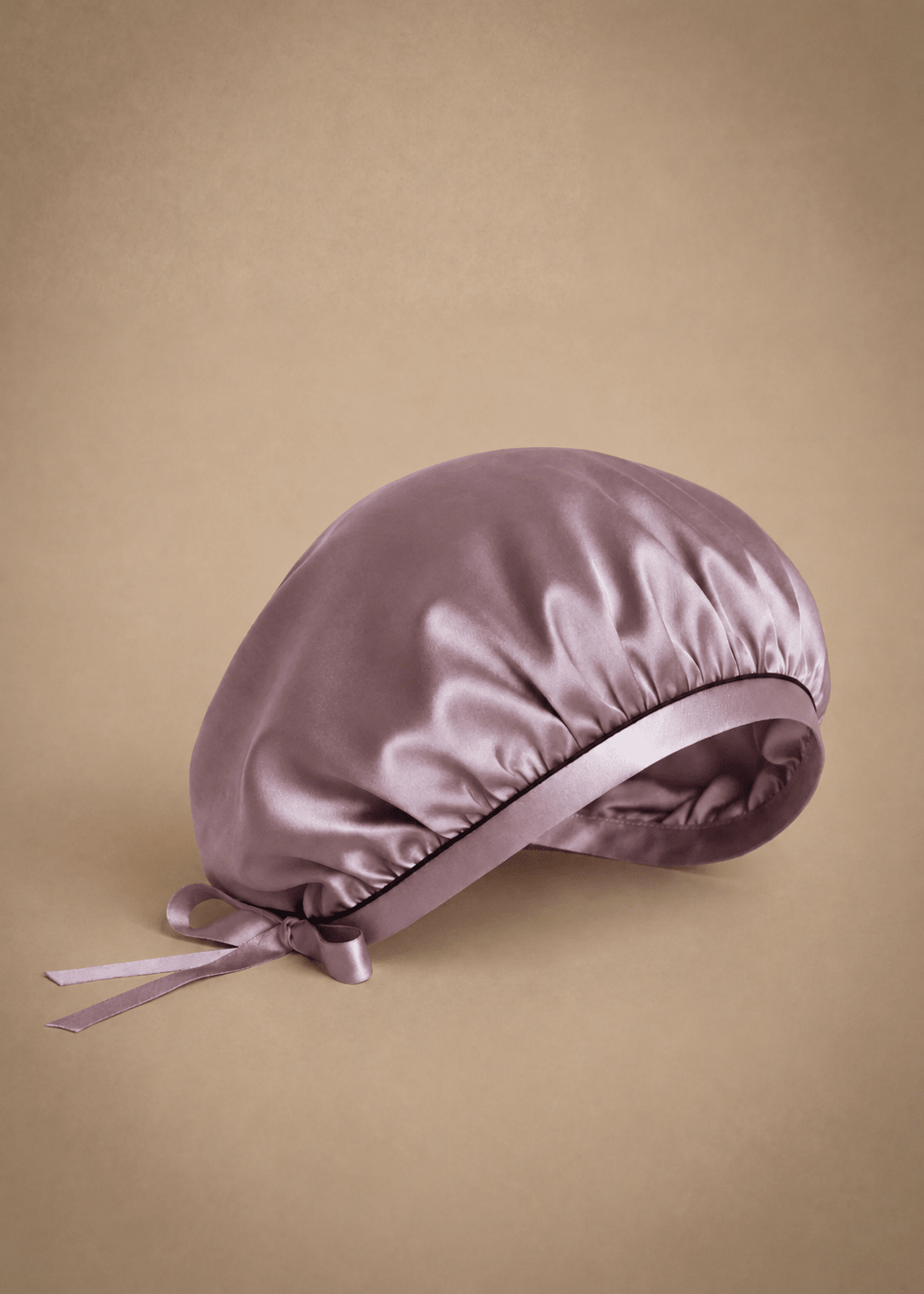 Mulberry lilac silk hair bonnet with midnight blue trim by Miaveriana