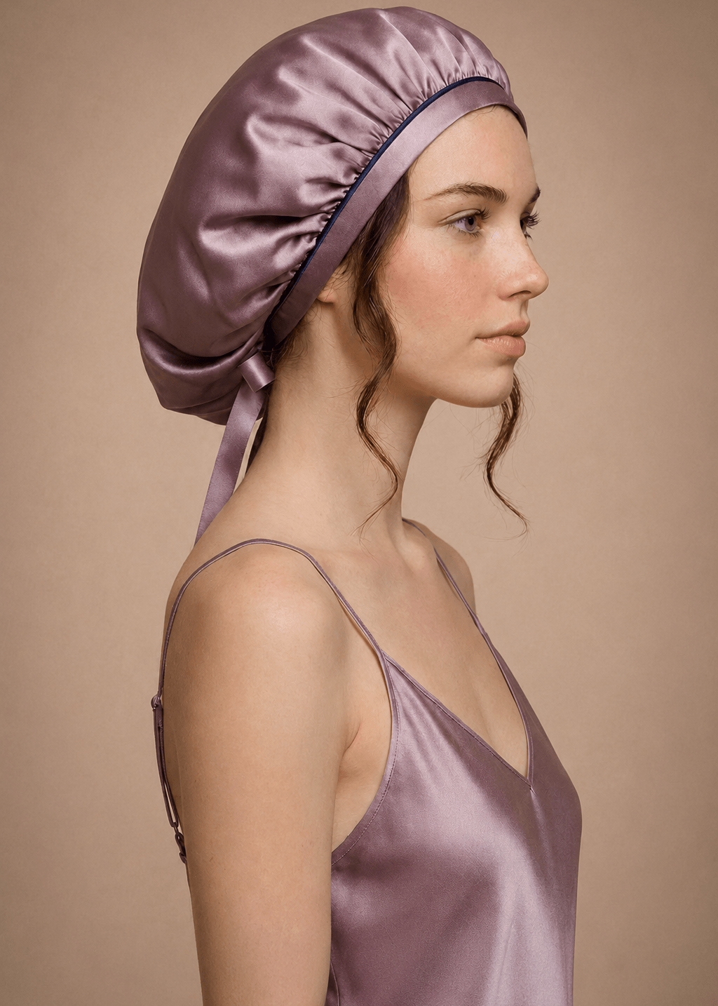 Mulberry lilac silk hair bonnet with midnight blue trim by Miaveriana